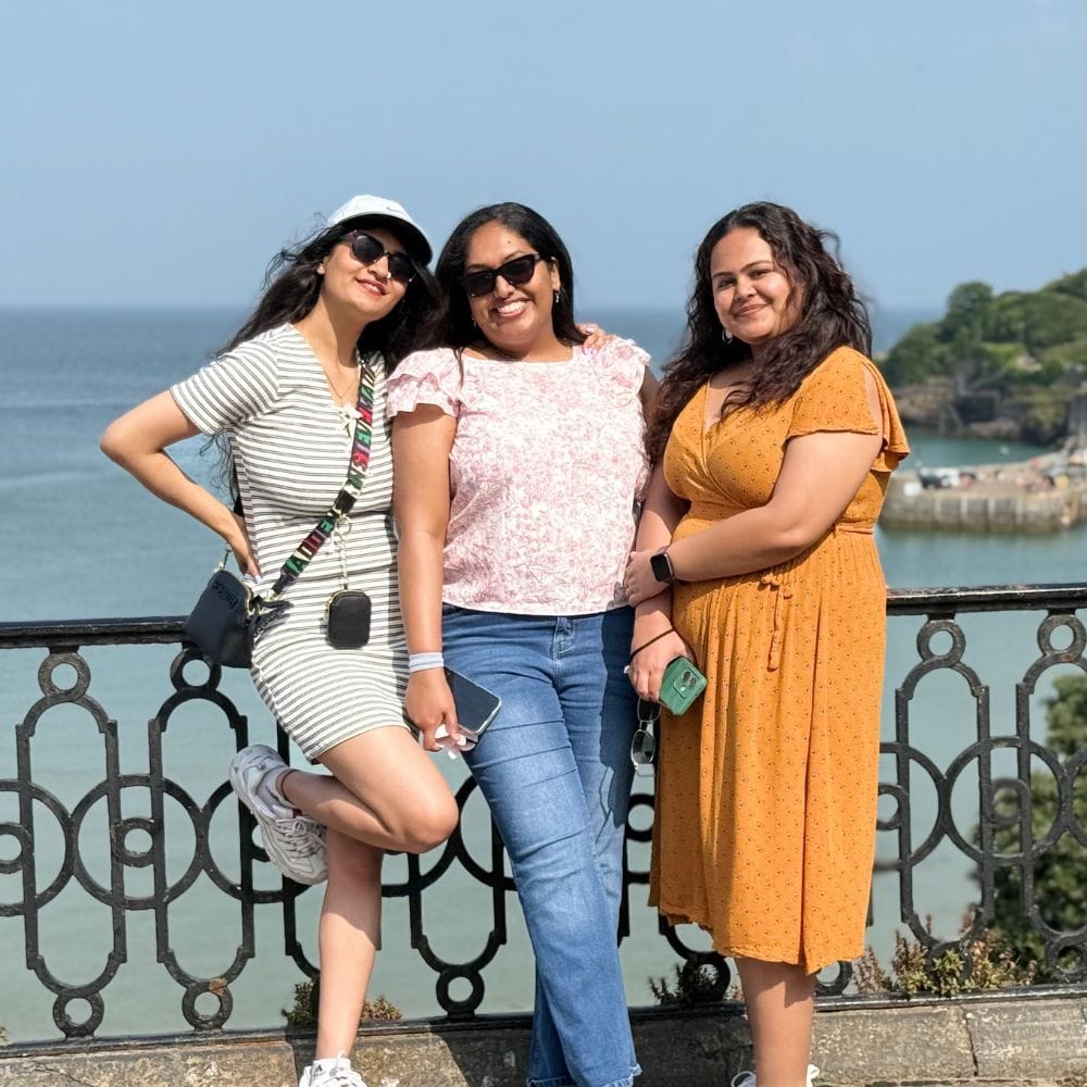 Friends Smiling next to beach