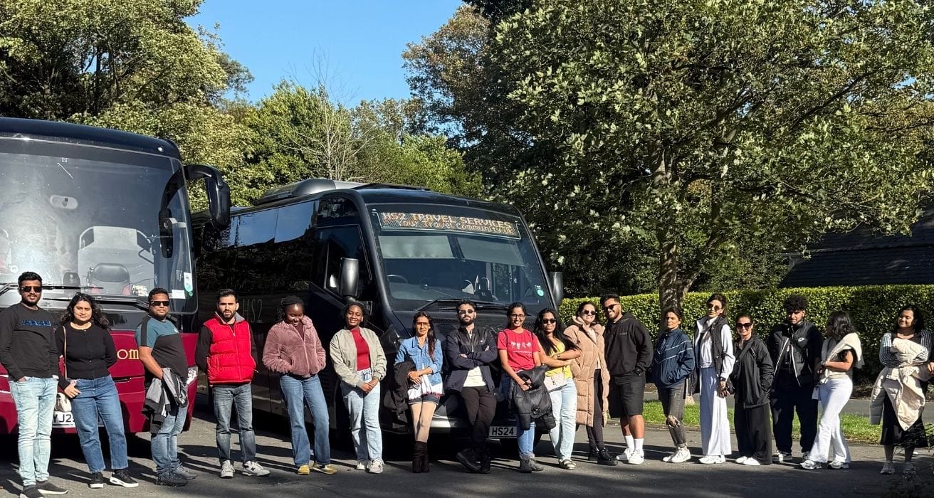 Group near the tour bus